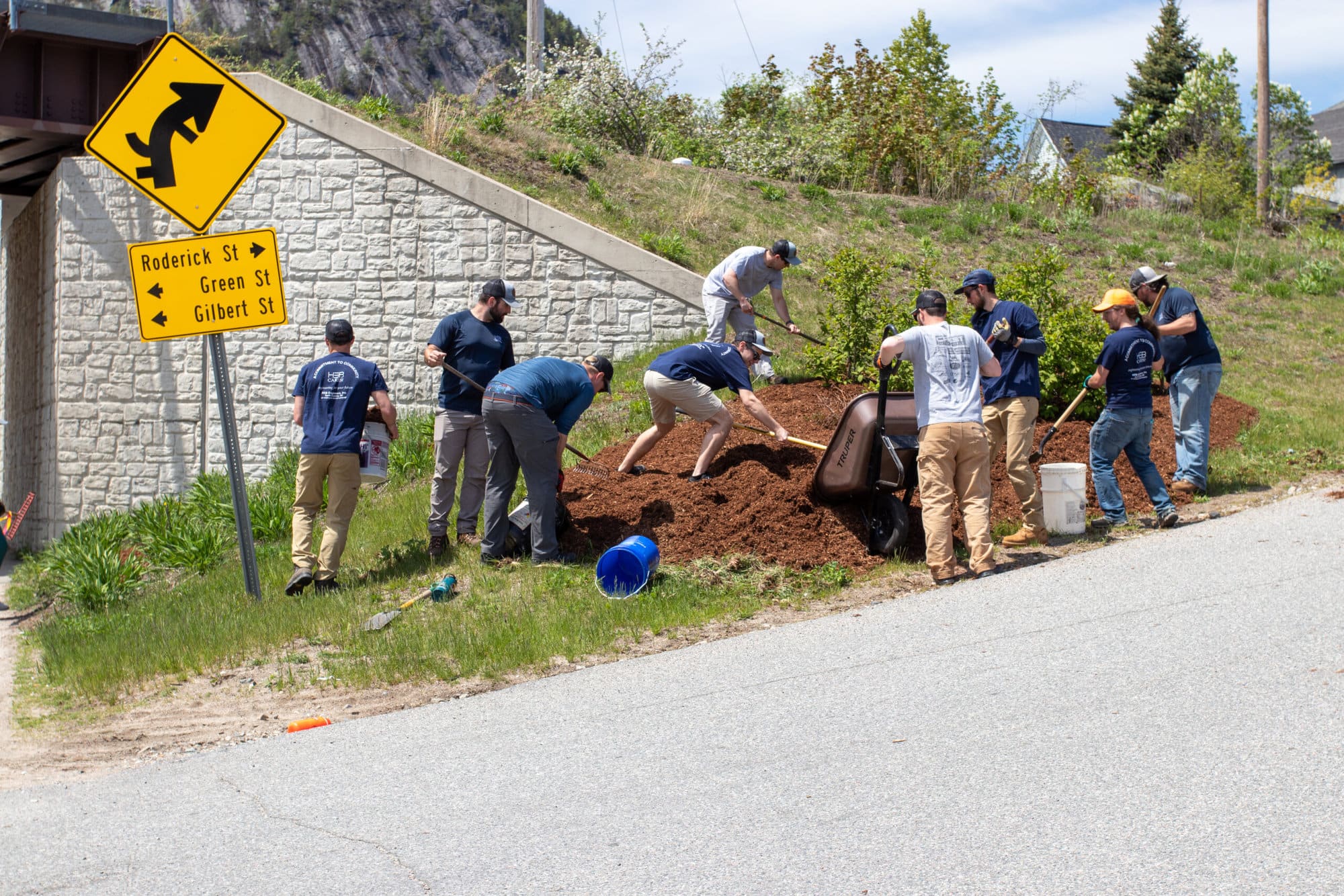 Group of HEB Employees mulching at Berlin Downtown Day of Caring