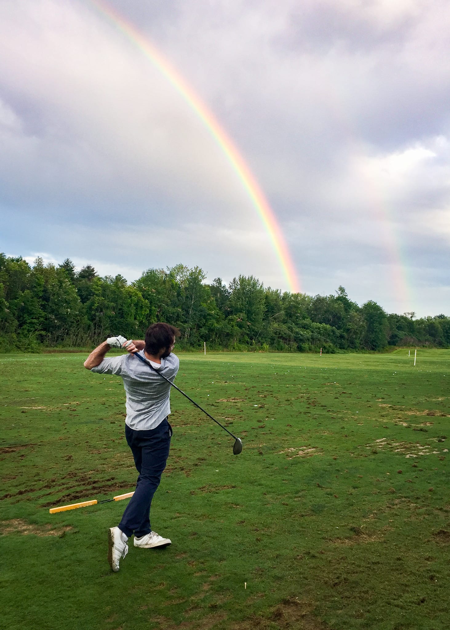 Torrey enjoys teeing off to a double rainbow at the North Conway Country Club.